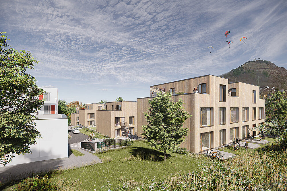 Visualisierung eines Wohnprojekts in Jena mit modernen Mehrfamilienhäusern in Holzbauweise, Grünflächen und dem Jenzig im Hintergrund.